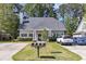 Inviting single-story home with a well-kept lawn, landscaping, and a convenient driveway for parking at 4807 Habersham Ln, Summerville, SC 29485