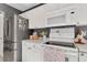Bright kitchen featuring modern appliances, light countertops, and stylish white cabinetry for a clean, organized look at 4807 Habersham Ln, Summerville, SC 29485