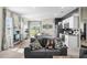 Inviting living room featuring a fireplace and seamless access to the open kitchen area at 483 Pender Woods Dr, Summerville, SC 29486