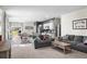Open-concept living room with modern finishes that seamlessly connect to the kitchen area at 483 Pender Woods Dr, Summerville, SC 29486