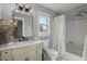 Stylish bathroom with modern fixtures, a large mirror, and a combination tub and shower at 49 Crosscreek Dr, Charleston, SC 29412