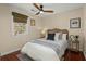 Inviting bedroom with a cozy bed, woven headboard, and natural light from the window at 49 Crosscreek Dr, Charleston, SC 29412