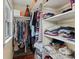 Walk-in closet with built-in shelving and hanging rods, providing ample storage at 49 Crosscreek Dr, Charleston, SC 29412