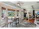 Bright dining nook with tile floors, and view to the fireplace room at 49 Crosscreek Dr, Charleston, SC 29412