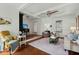 Inviting living room with white walls, hardwood floors, and a vintage-style rug at 49 Crosscreek Dr, Charleston, SC 29412