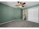 Bedroom with closet, ceiling fan, and a door leading to an upstairs hallway at 5418 Percival Ln, Charleston, SC 29420