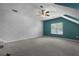 Spacious bedroom featuring a white brick accent wall, neutral carpet, and a ceiling fan at 5418 Percival Ln, Charleston, SC 29420