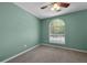 Bedroom with carpet, ceiling fan, and a window at 5418 Percival Ln, Charleston, SC 29420