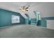 Large bonus room features vaulted ceilings, carpet, storage shelves, and a window at 5418 Percival Ln, Charleston, SC 29420