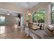 Breakfast nook offers a view to a cozy living room with a fireplace at 5418 Percival Ln, Charleston, SC 29420