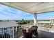 Enjoy ocean views from this cozy balcony with seating for two at 5802 Palmetto Dr # B-501, Isle of Palms, SC 29451