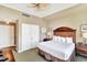 Comfortable bedroom with a king-size bed, closet, and soft lighting at 5802 Palmetto Dr # B-501, Isle of Palms, SC 29451