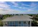 Charming multi-story home with a metal roof and lush surrounding landscape at 5802 Palmetto Dr # B-501, Isle of Palms, SC 29451