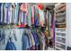 Walk-in closet offers ample storage with dual hanging rods and built-in shelving at 603 Curing Ct, Moncks Corner, SC 29461