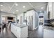 Open concept kitchen with granite counters, stainless appliances, and breakfast bar at 603 Curing Ct, Moncks Corner, SC 29461