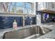 Kitchen sink detail with stylish faucet, soap dispenser, and bright natural light at 603 Curing Ct, Moncks Corner, SC 29461
