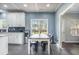 Open kitchen eating area with backyard views and lots of natural light at 603 Curing Ct, Moncks Corner, SC 29461