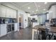Bright kitchen featuring stainless steel appliances and adjacent breakfast nook with large window at 603 Curing Ct, Moncks Corner, SC 29461