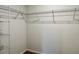 Walk-in closet with ample storage featuring a configurable white wire shelving system at 703 Hilchot Dr, Summerville, SC 29486
