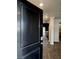 Inviting entryway featuring wood floors and a glimpse into the kitchen at 703 Hilchot Dr, Summerville, SC 29486