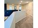 Bright hallway with neutral carpet and a unique clock accent wall at 703 Hilchot Dr, Summerville, SC 29486