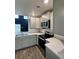 Modern kitchen with stainless steel appliances, sleek countertops, and ample cabinet space at 703 Hilchot Dr, Summerville, SC 29486