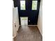 Living room features tall ceilings, dark accent wall, two windows and sliding door at 703 Hilchot Dr, Summerville, SC 29486