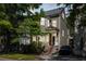 Beautiful two-story home with a classic design, enhanced by lush landscaping at 76 Radcliffe St, Charleston, SC 29403