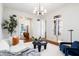 Stylish living room showcasing an open layout with hardwood floors and neutral tones at 76 Radcliffe St, Charleston, SC 29403