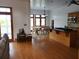 Open-concept living space with hardwood floors, seamlessly connects the kitchen, dining, and sitting areas at 7997 Doar Rd # C-3, Awendaw, SC 29429
