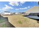 Expansive backyard area with privacy fence, perfect for outdoor activities and relaxation at 819 Casey St, Moncks Corner, SC 29461