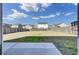 Fenced backyard with grass at 819 Casey St, Moncks Corner, SC 29461