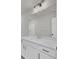 Bathroom featuring a long vanity, a large mirror, modern lights, and ample cabinet space at 819 Casey St, Moncks Corner, SC 29461