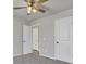 Neutral bedroom featuring a ceiling fan, carpet floors, and a closet at 819 Casey St, Moncks Corner, SC 29461