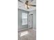 An empty bedroom with a window and a doorway featuring carpeted floors at 819 Casey St, Moncks Corner, SC 29461