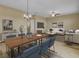 Combined dining and living area with wood floors and chandelier lighting at 819 Casey St, Moncks Corner, SC 29461