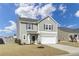 Attractive two-story home with a well-kept lawn, two car garage, and welcoming front entrance at 819 Casey St, Moncks Corner, SC 29461