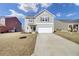 Beautiful two-story home with attached garage, well-maintained landscaping, and inviting curb appeal at 819 Casey St, Moncks Corner, SC 29461