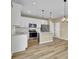 Stylish kitchen featuring white cabinets, stainless steel appliances, and an island at 819 Casey St, Moncks Corner, SC 29461