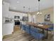 Modern kitchen with sleek white cabinets and stainless steel appliances, plus a dining area at 819 Casey St, Moncks Corner, SC 29461