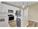 Contemporary kitchen featuring stainless steel appliances, an island, and ample cabinet space at 819 Casey St, Moncks Corner, SC 29461