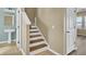 Staircase leading to second floor next to a bathroom with a pedestal sink at 819 Casey St, Moncks Corner, SC 29461