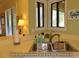 Well-lit kitchen featuring a corner sink and bright natural lighting from the windows at 855 Club Cottage Rd, Edisto Island, SC 29438