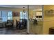 Inviting open floor plan with a dining table, chairs, and view of the kitchen at 855 Club Cottage Rd, Edisto Island, SC 29438