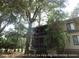 Large screened in porch to help you enjoy days and evenings outdoors at 855 Club Cottage Rd, Edisto Island, SC 29438