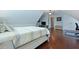 Bedroom features wood floors, vaulted ceilings, and a TV at 8566 Royal Palm Ln, North Charleston, SC 29420