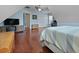 Bedroom has vaulted ceilings, wood floors, closet, and a TV at 8566 Royal Palm Ln, North Charleston, SC 29420
