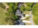 A home's beautifully landscaped yard and mature trees complement its surroundings, providing a private oasis for relaxation and enjoyment at 8642 W Fairway Woods Dr, North Charleston, SC 29420