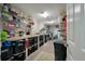 Organized basement or utility room with ample storage and shelving at 8642 W Fairway Woods Dr, North Charleston, SC 29420