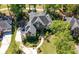 Beautiful home featuring professionally landscaped yard and covered entryway, perfect for welcoming guests and outdoor enjoyment at 8642 W Fairway Woods Dr, North Charleston, SC 29420